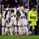 I giocatori della Juventus esultano dopo un gol in Champions League